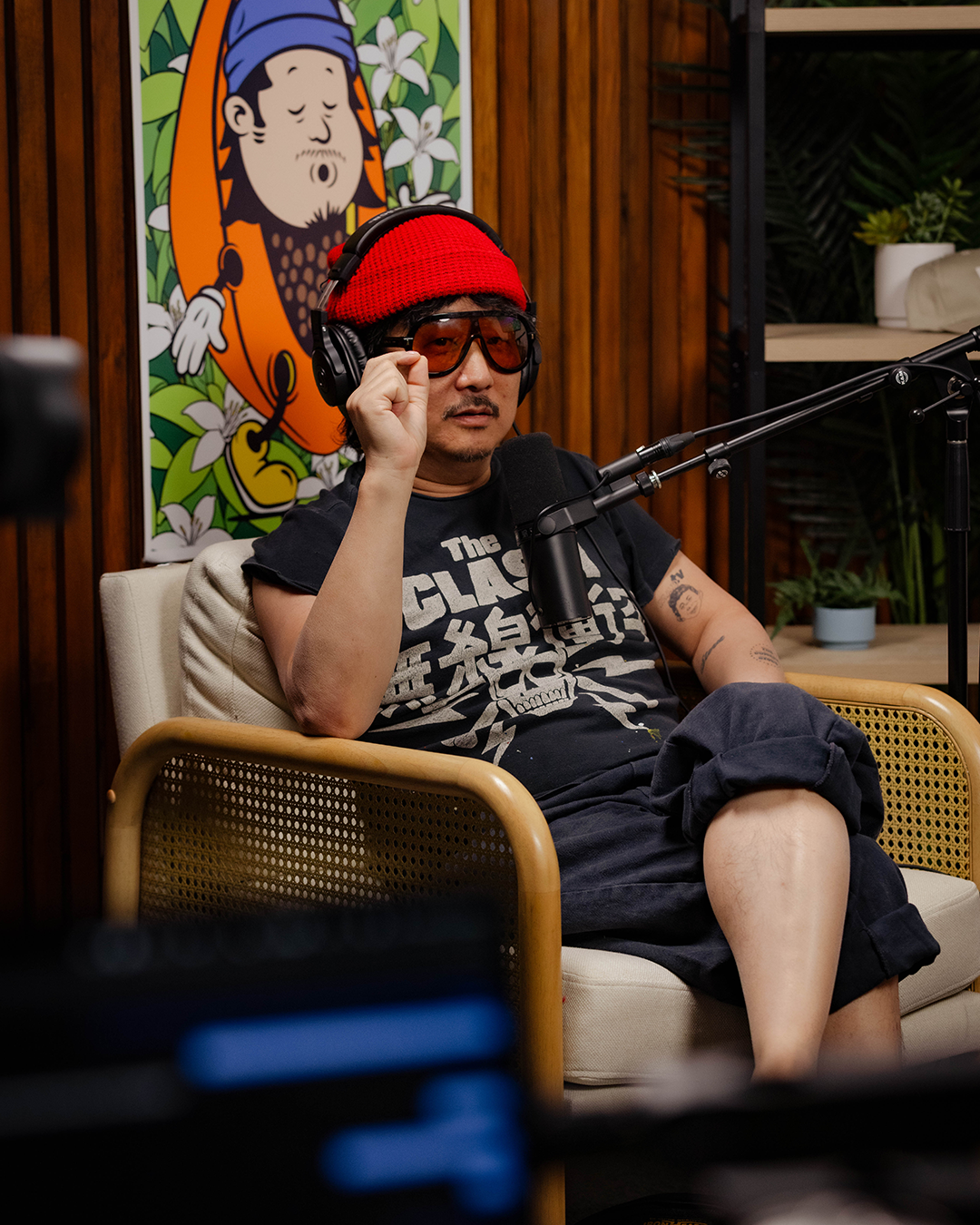 Guest with headphones in studio